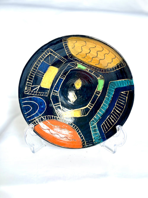 African-style, ornately decorated ceramic plate, hand-crafted, wheel-thrown