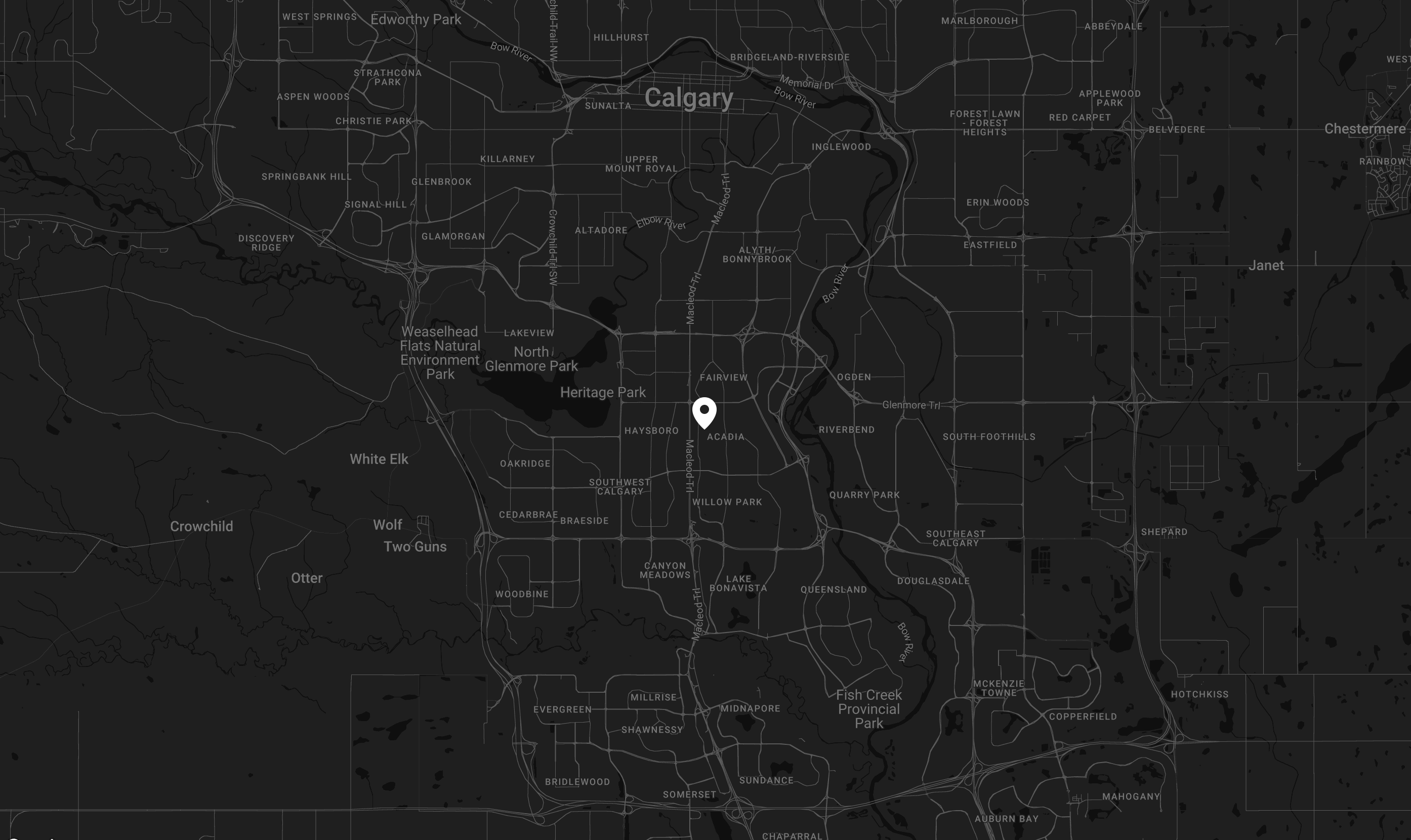 Map of Calgary with a pin marker on a black background